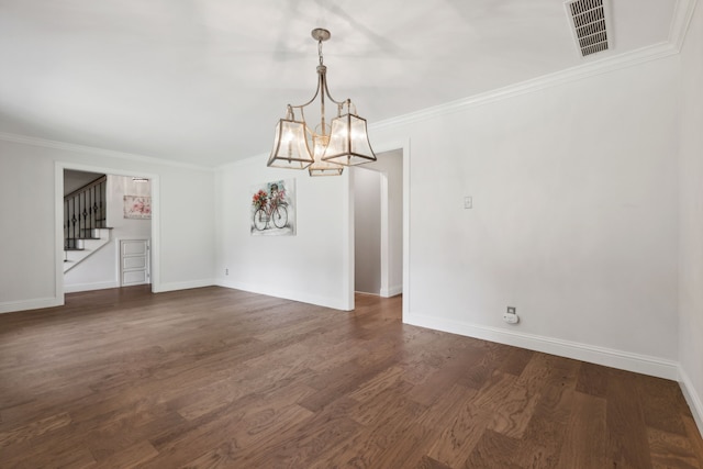 unfurnished dining area with crown molding, dark wood-type flooring, and an inviting chandelier