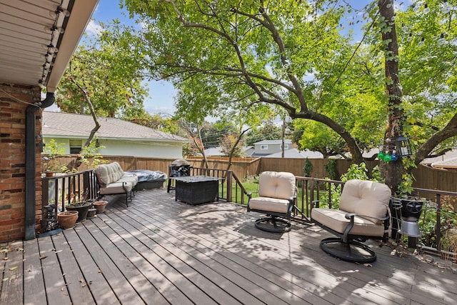 deck with an outdoor living space