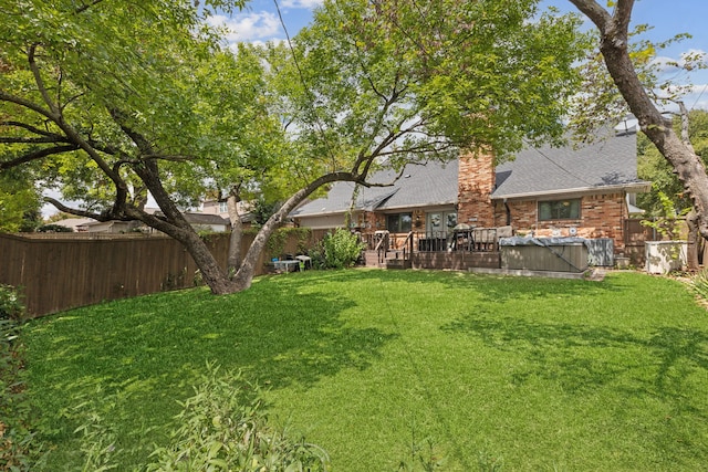 view of yard with a deck