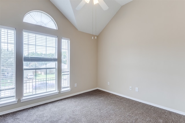 spare room featuring carpet, ceiling fan, and plenty of natural light