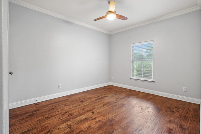 empty room featuring ceiling fan, hardwood / wood-style flooring, and crown molding