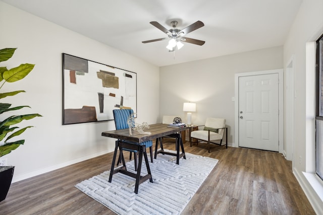 office area with dark hardwood / wood-style flooring and ceiling fan