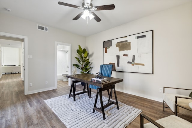 home office with ceiling fan and wood-type flooring