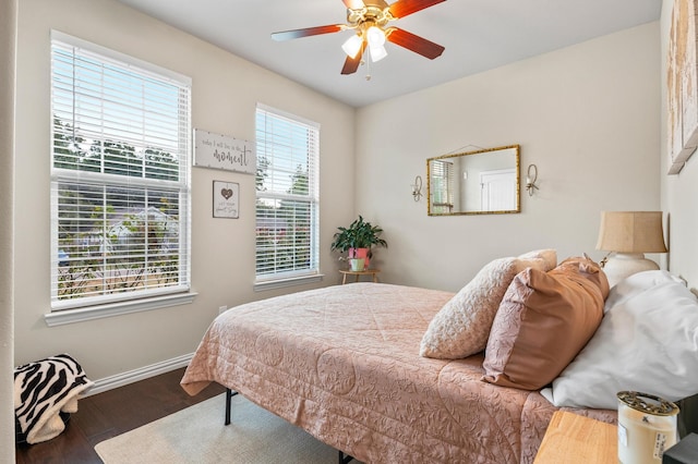 bedroom featuring ceiling fan and hardwood / wood-style flooring