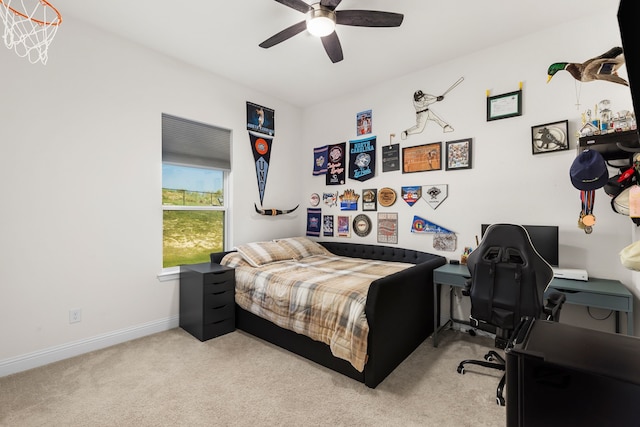 bedroom featuring ceiling fan and light colored carpet