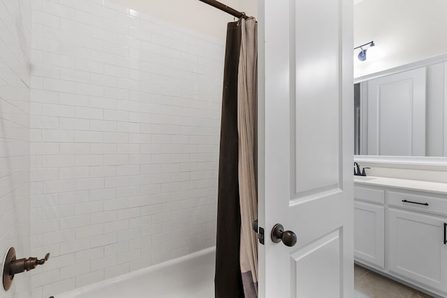 bathroom with vanity and shower / bath combo with shower curtain