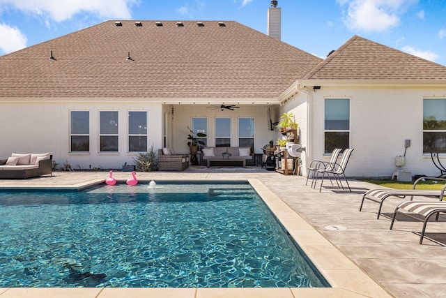 view of pool featuring a patio, an outdoor living space, and ceiling fan