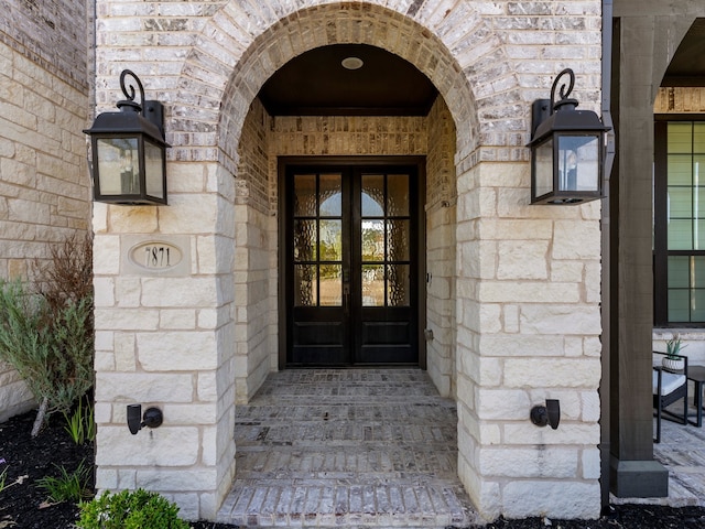 doorway to property featuring french doors