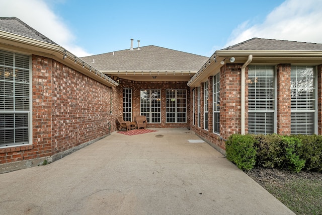 property entrance with a patio