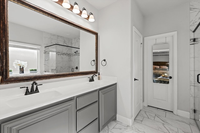 bathroom with walk in shower and vanity