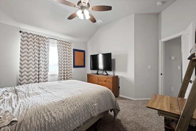 bedroom with carpet floors, vaulted ceiling, and ceiling fan