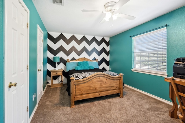 bedroom featuring ceiling fan and carpet floors