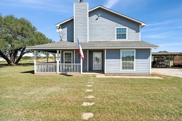 country-style home with a front yard, a carport, and covered porch