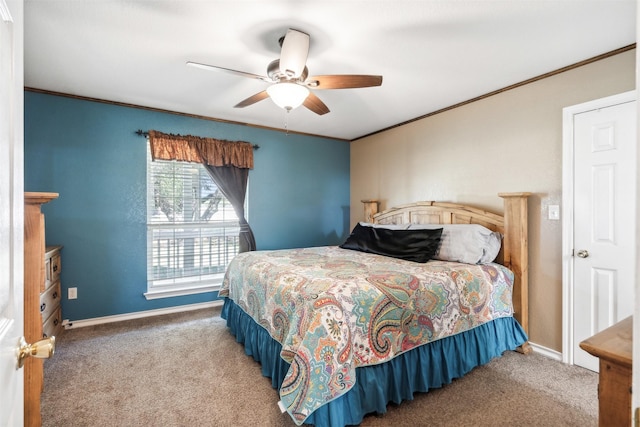 115 Rosser Ranch Rd, Graham, TX 76450 - bedroom with carpet, crown molding, baseboards, and a ceiling fan