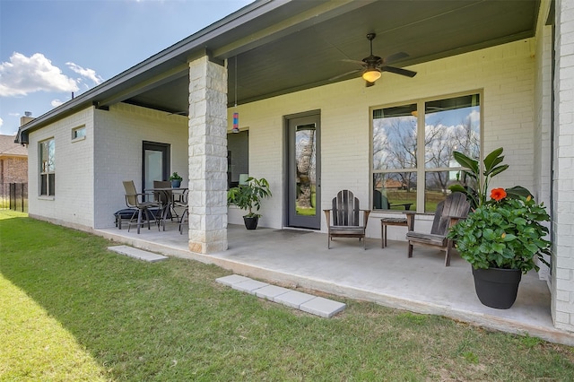 view of patio / terrace featuring ceiling fan