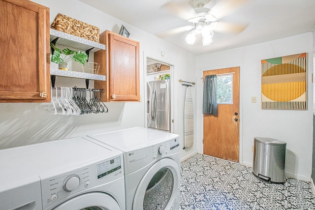 laundry room featuring cabinets, independent washer and dryer, and ceiling fan