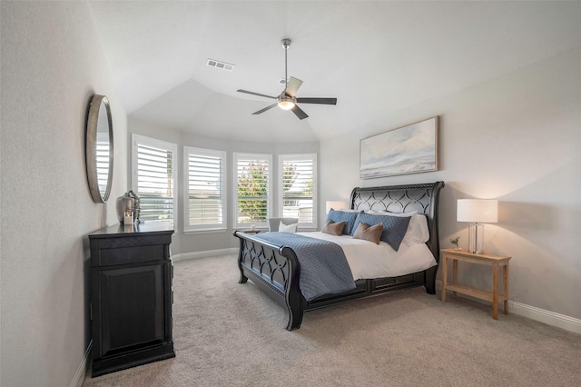 bedroom featuring ceiling fan, light colored carpet, and lofted ceiling