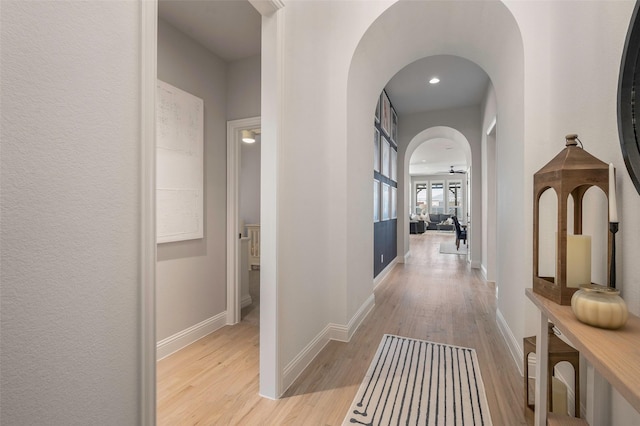 hallway with light wood-type flooring