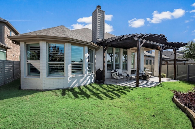 rear view of property featuring a yard, a patio, an outdoor hangout area, and a pergola