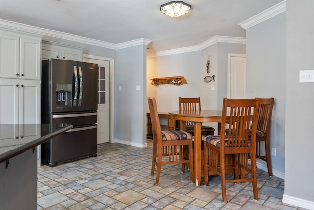 dining room with crown molding