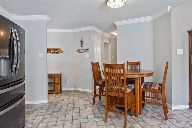 dining room with ornamental molding