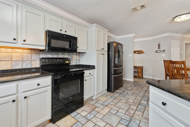 kitchen with black appliances, dark stone counters, white cabinets, and ornamental molding