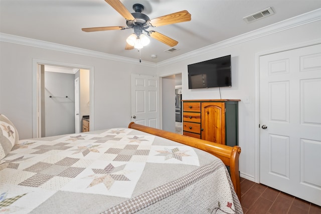 bedroom with ceiling fan and crown molding