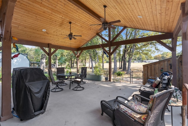 view of patio featuring ceiling fan, area for grilling, and a gazebo