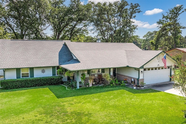 single story home featuring a garage and a front lawn