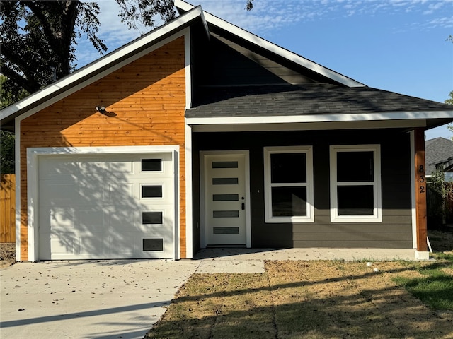 view of front of home with a garage