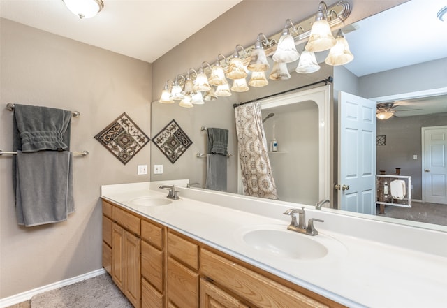 bathroom featuring ceiling fan and vanity