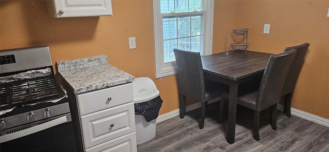 dining room featuring dark hardwood / wood-style flooring