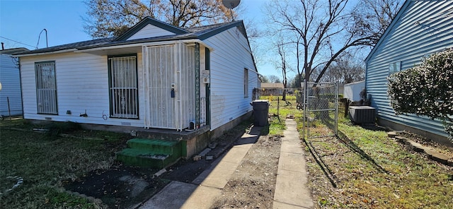 view of property exterior with central AC unit