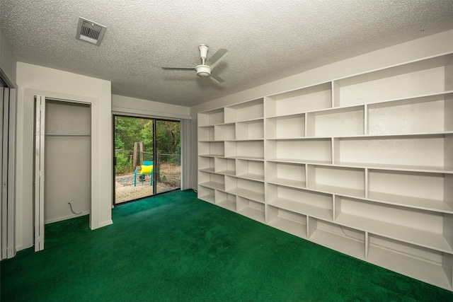 interior space with ceiling fan