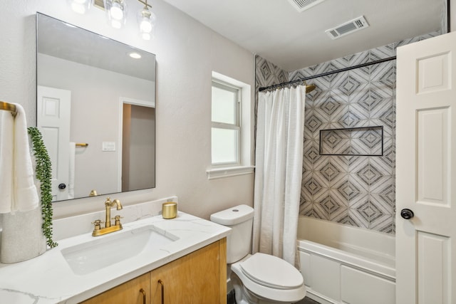 full bathroom with shower / bath combination with curtain, vanity, and toilet