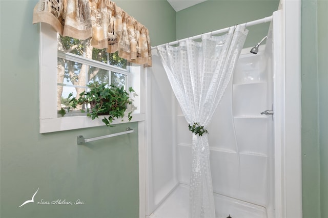 bathroom with curtained shower