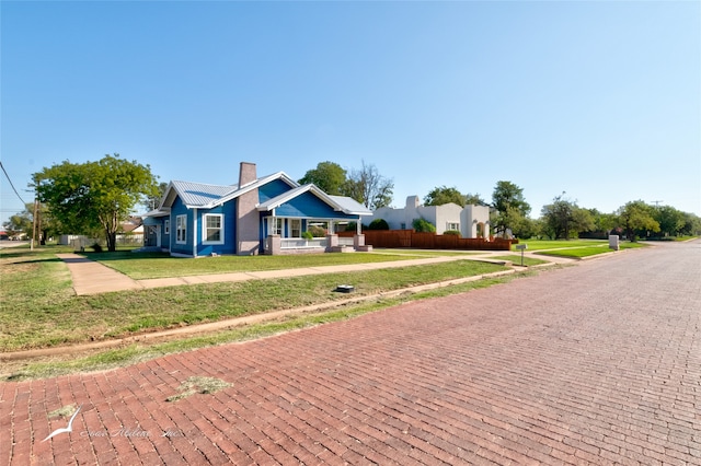 view of front facade with a front lawn