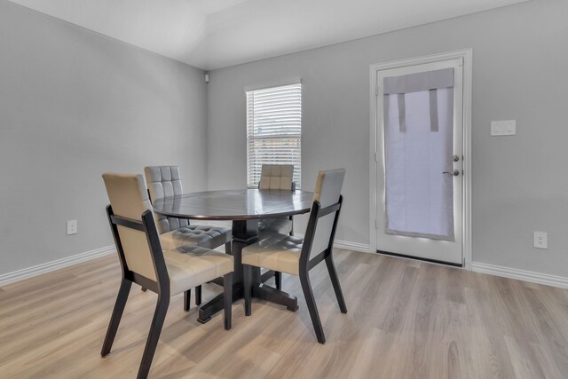 dining space featuring light hardwood / wood-style flooring