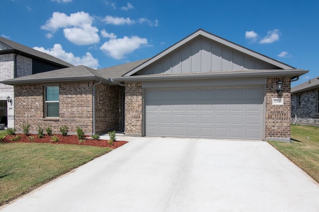 ranch-style house with a garage and a front lawn