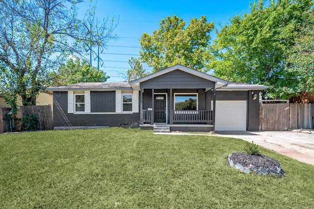 ranch-style house with a garage, covered porch, and a front yard