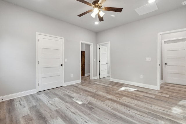 unfurnished bedroom with light hardwood / wood-style floors and ceiling fan