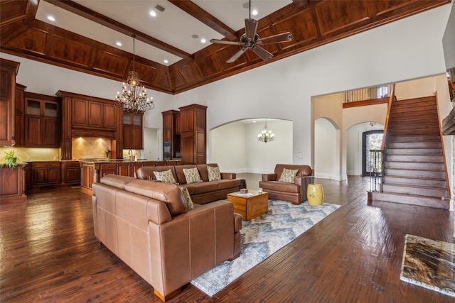 living room featuring ceiling fan with notable chandelier, beam ceiling, high vaulted ceiling, and dark hardwood / wood-style floors