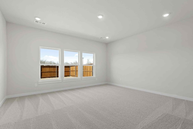 empty room with carpet flooring