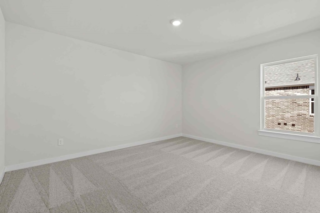 empty room featuring carpet flooring