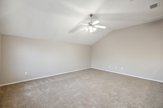 additional living space featuring carpet flooring, ceiling fan, and lofted ceiling