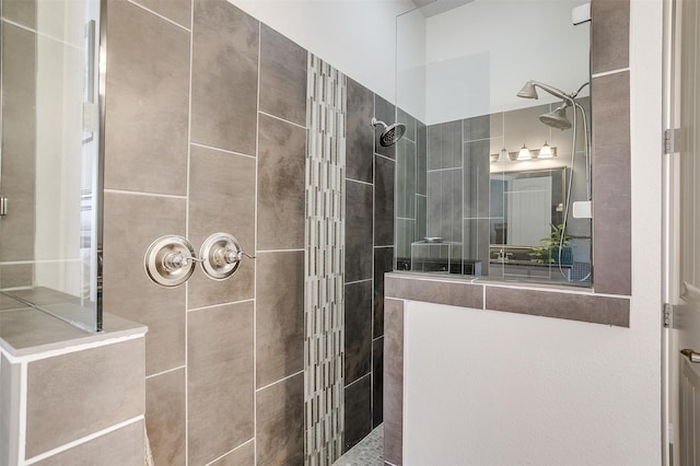 bathroom featuring a tile shower