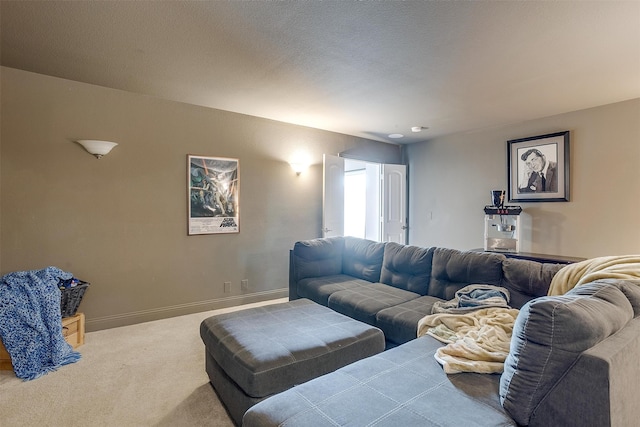 living room featuring a textured ceiling and carpet flooring