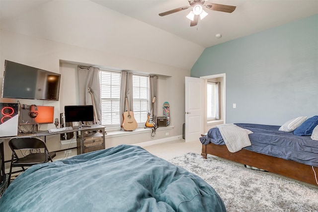 bedroom featuring vaulted ceiling, ceiling fan, and light carpet