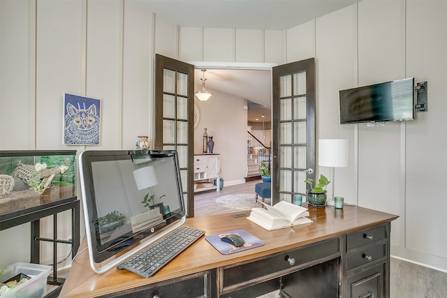 office space with light hardwood / wood-style floors