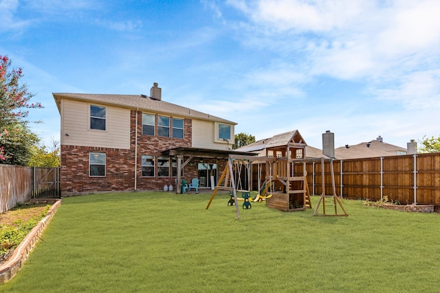 exterior space with a playground, a pergola, and ceiling fan